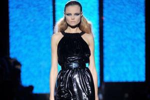 Versace marks comeback with first sale
